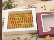 A Box Of Baklava Fingers With Cashews