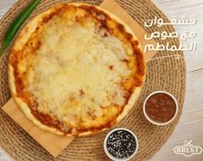 Kashkawan With Tomato Sauce Manqusha