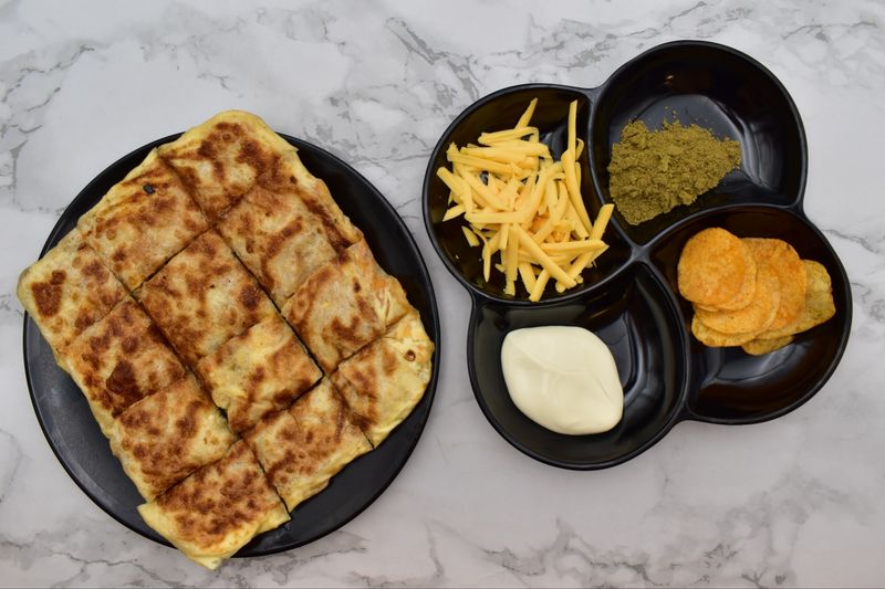 مطبق جبن سايل و شبس عمان - عادي